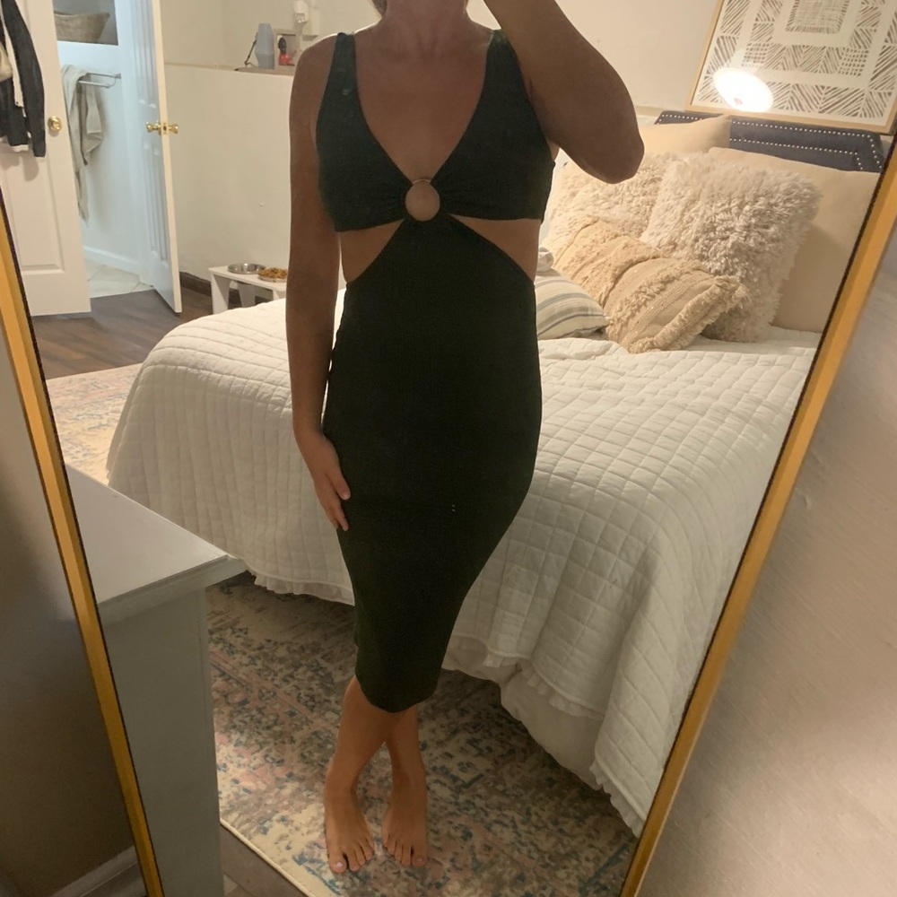 Dark green dress with cut outs. Very pretty and flattering.